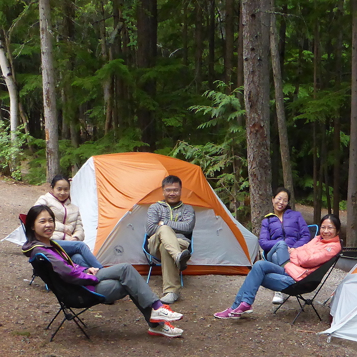 Man camped at Glacier National Park with his staff in August 2014 medium 700px